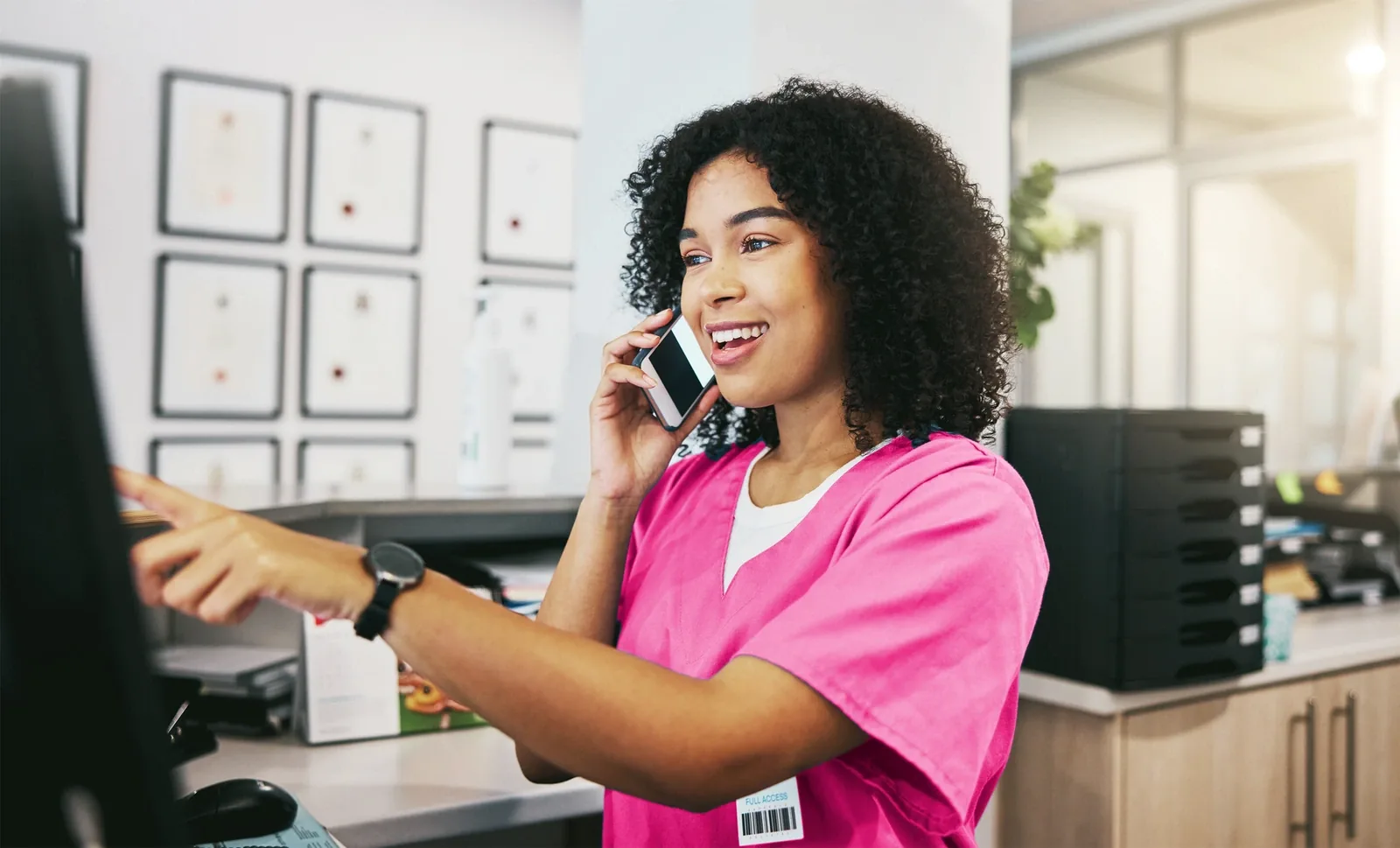 Care professional speaking with someone by phone