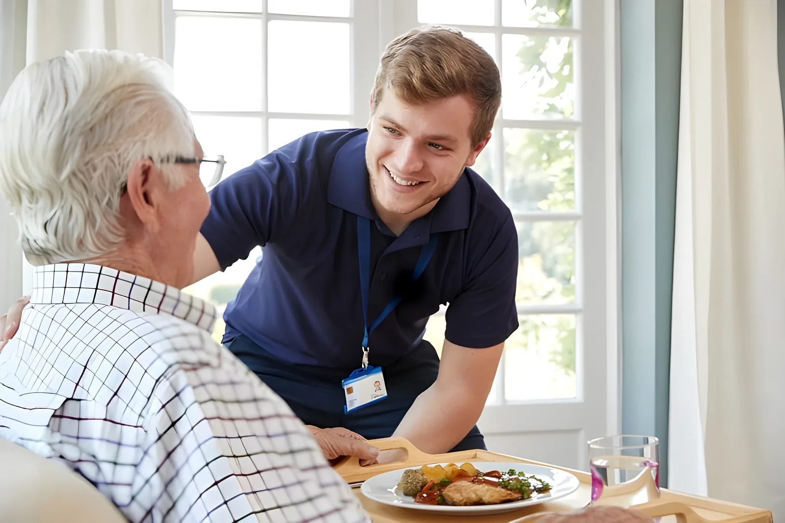 Personal support worker assisting a client at home